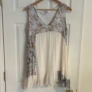 Boutique Floral Sleeveless Top with Ruffle Hem